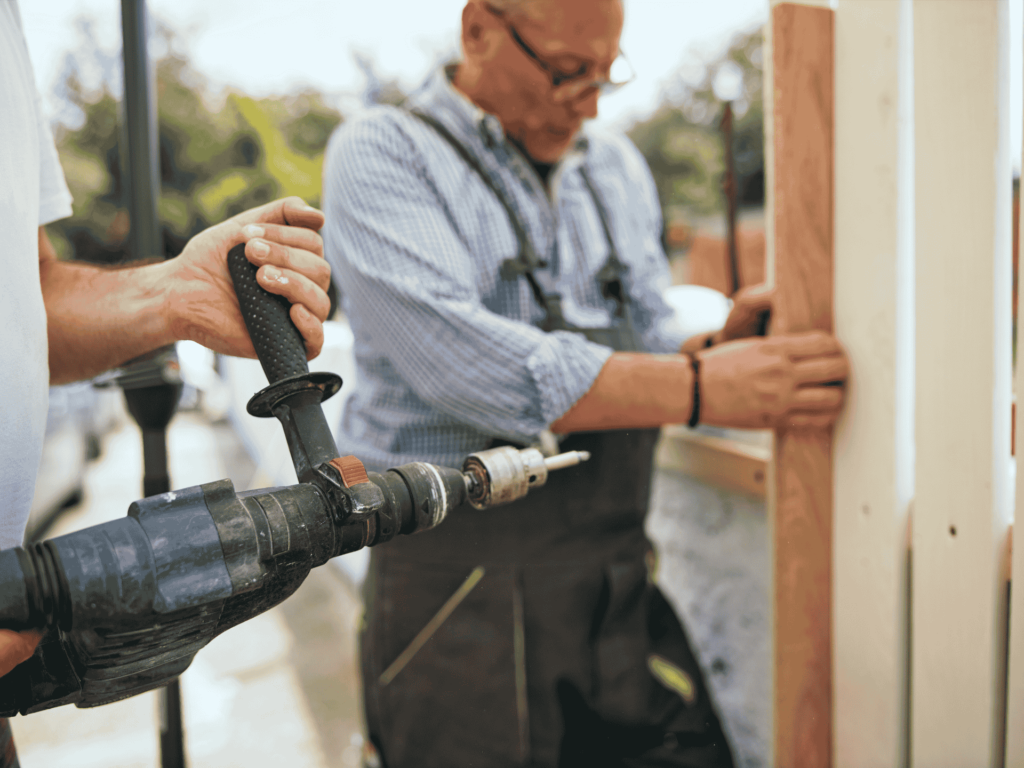 Wooden fence installation process by expert contractors.